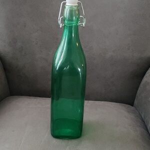 Vintage green glass bottle from Italy